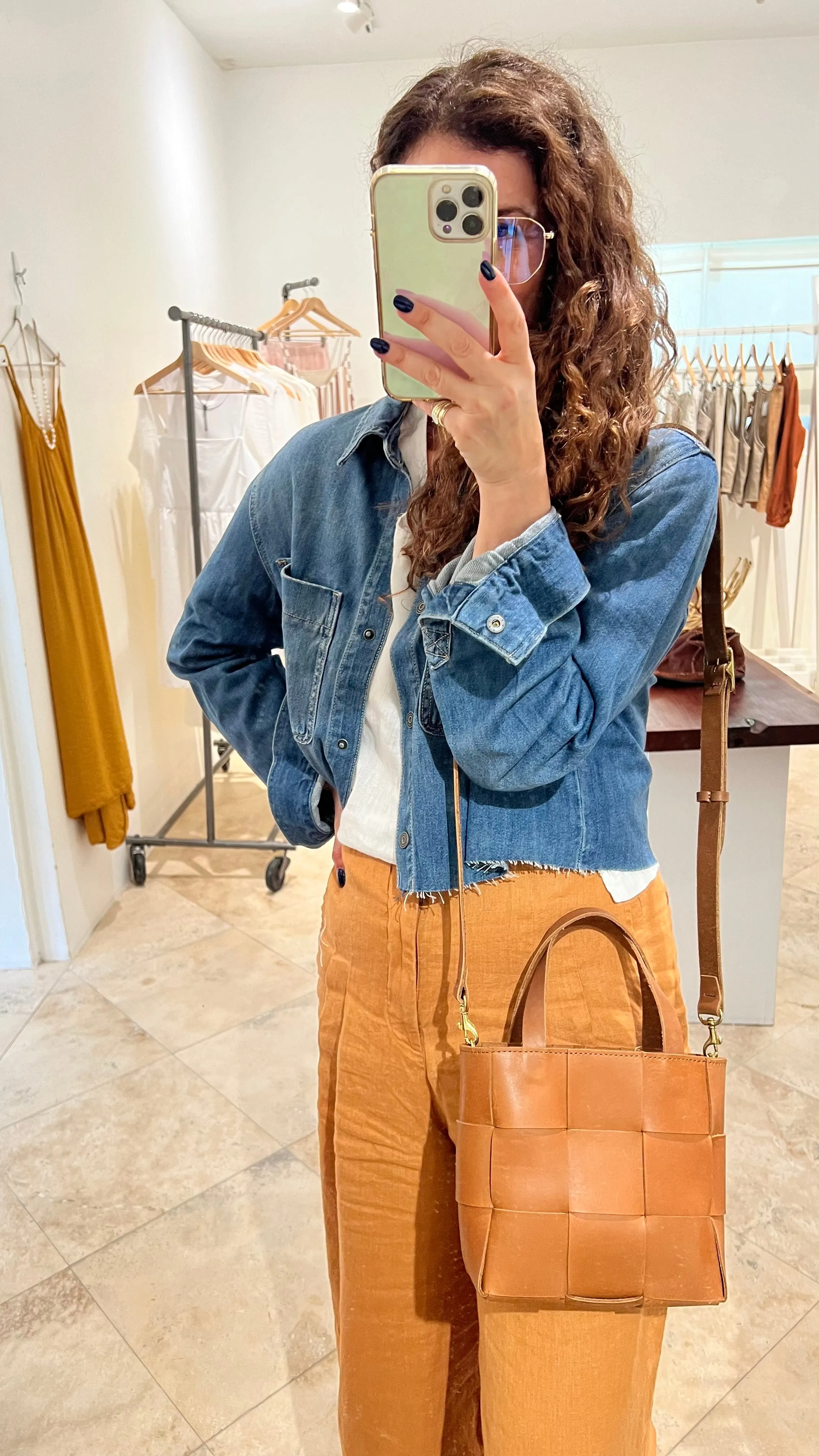Handcrafted Petite woven leather tote with crossbody strap.