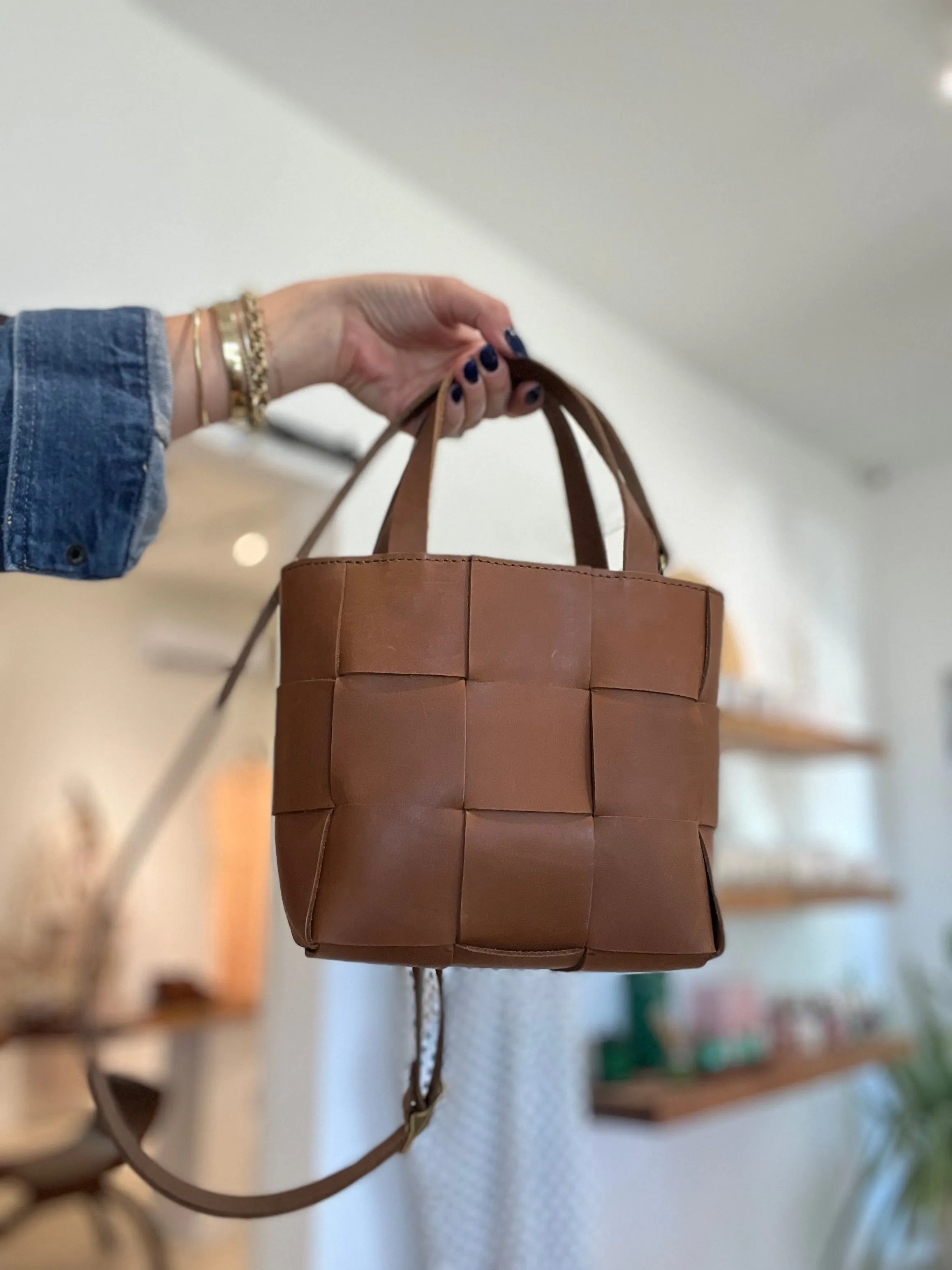 Handcrafted Petite woven leather tote with crossbody strap.