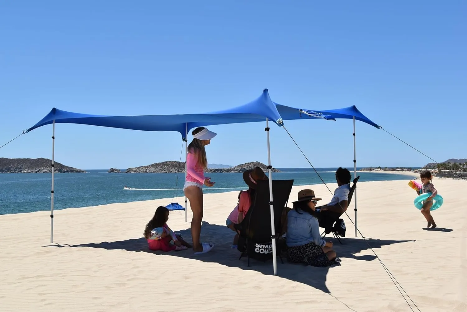 Nomad Beach Shade | 9x8.5 ft. Beach Tent Sun Shelter with UPF50  Protection, Adjustable Shade Tent | Quick 5-Min Setup, 25 MPH Windproof, Light & Compact, Works on Grass & Sand | 4-Posts