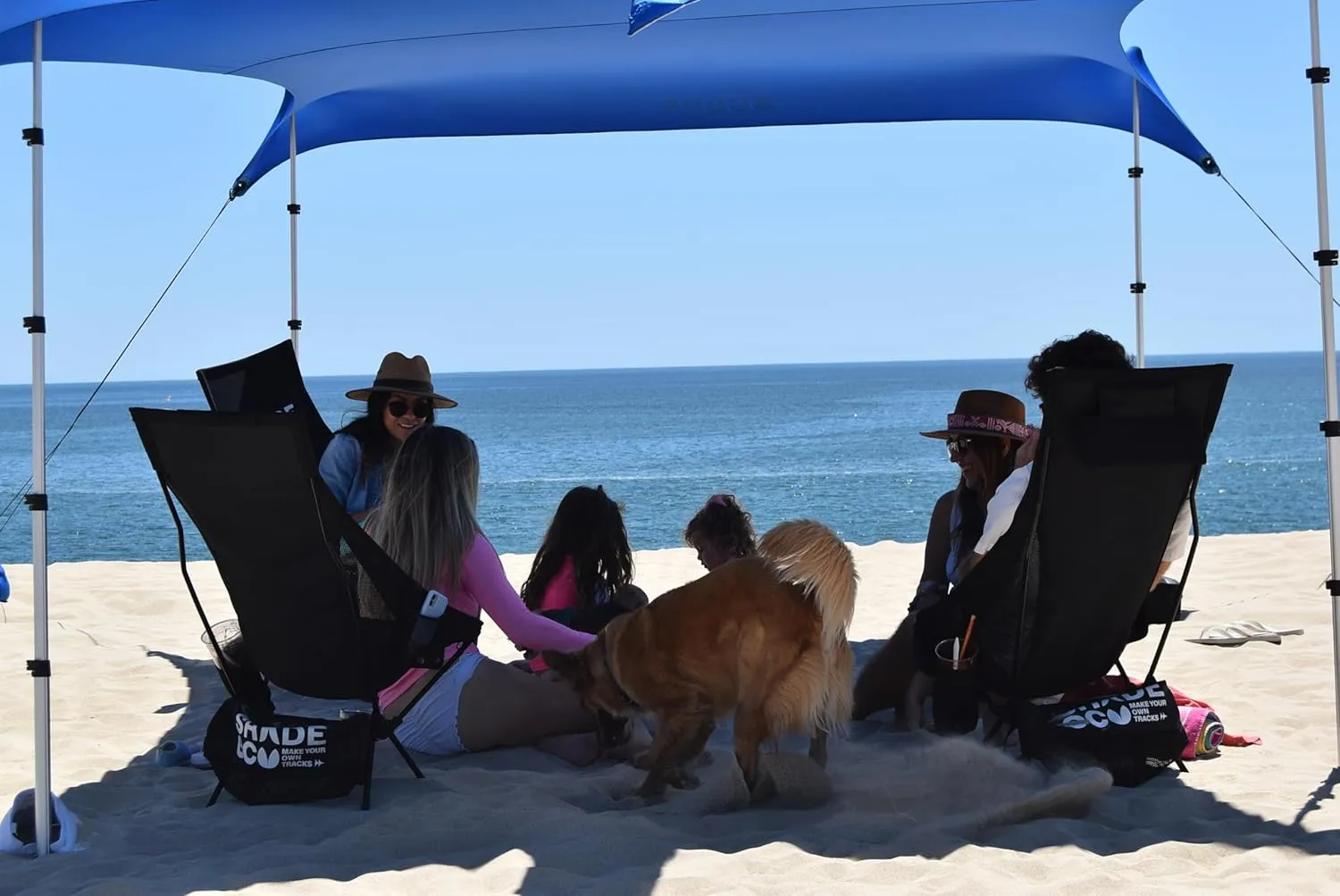 Nomad Beach Shade | 9x8.5 ft. Beach Tent Sun Shelter with UPF50  Protection, Adjustable Shade Tent | Quick 5-Min Setup, 25 MPH Windproof, Light & Compact, Works on Grass & Sand | 4-Posts